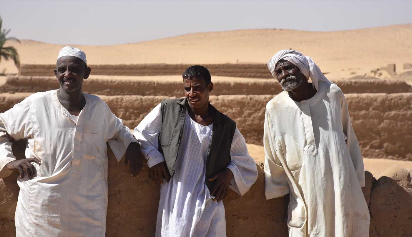 Three men from an unreached people group